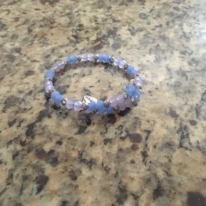 Lite Blue Alex and Ani wrap bracelet.